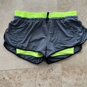 Nike grey shorts with built in yellow spandex